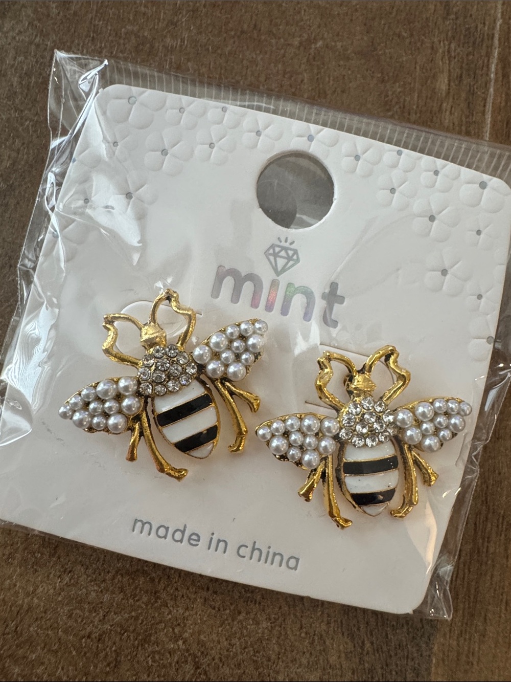 Designer Inspired Gold Bee Stud Earrings with White Pearls and Black Stripes.